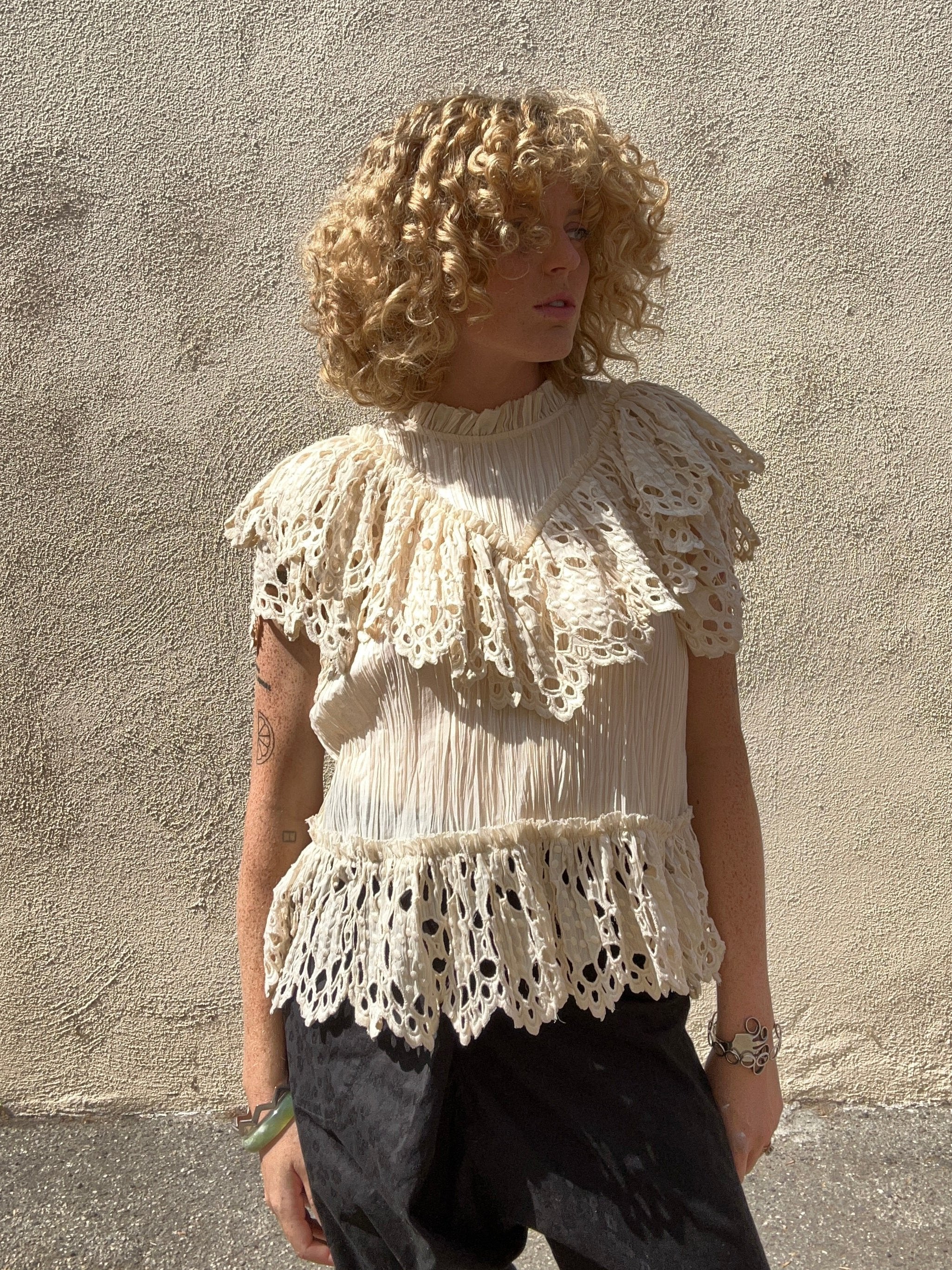 cream ruffle top