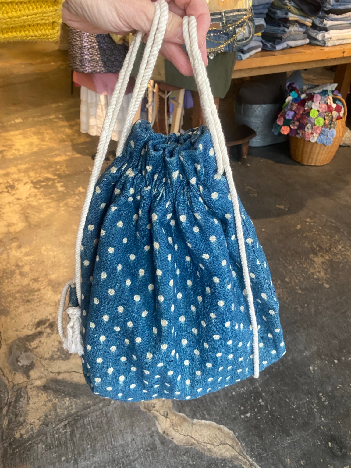 Lineage Botanica indigo dotted drawstring backpack with cream rope straps