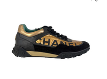 Chanel Black and Gold Sneakers