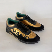 Chanel Black and Gold Sneakers
