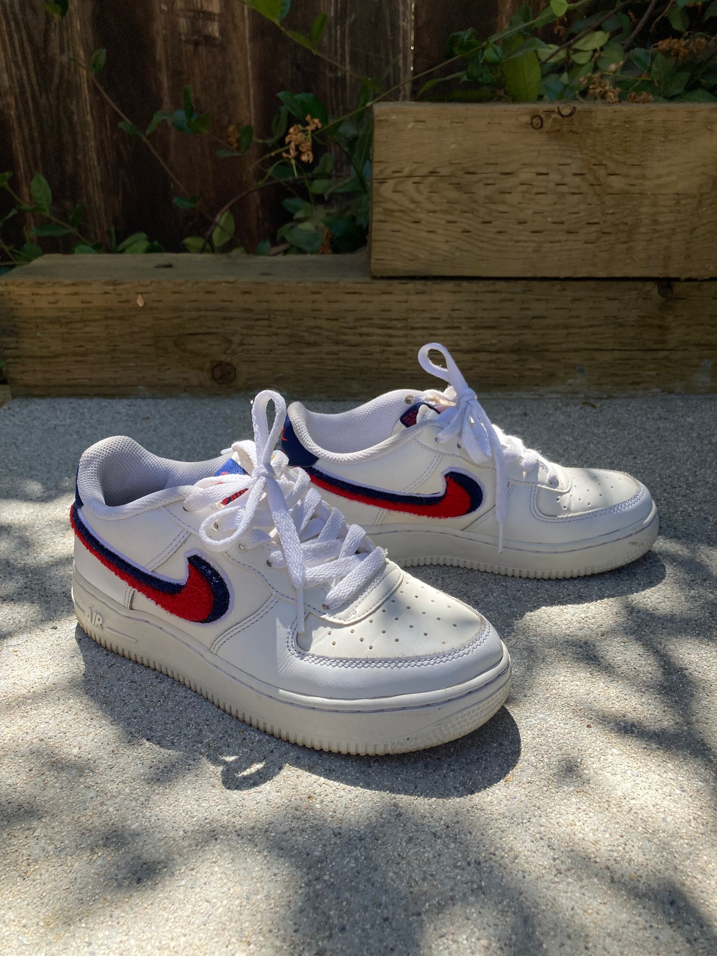 White Nike Air Force 1 with Red and Blue "Chenille Swoosh" size 6.5 Women's - The Curatorial Dept.